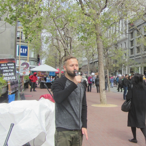 CAL PREACHES TO THOUSANDS OF ANTI-GUN DEMONSTRATORS AT 5TH AND MARKET.