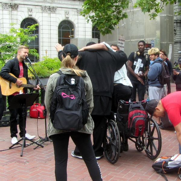 CAL SINGS AT 5TH AND MARKET ST.