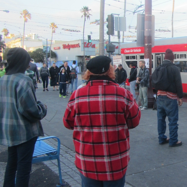 CAL SINGS AT 16TH AND MISSION.