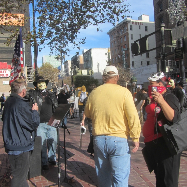 JOHN PREACHES TO &quot;ANONYMOUS&quot; HECKLERS AT 7TH ST AND MARKET.