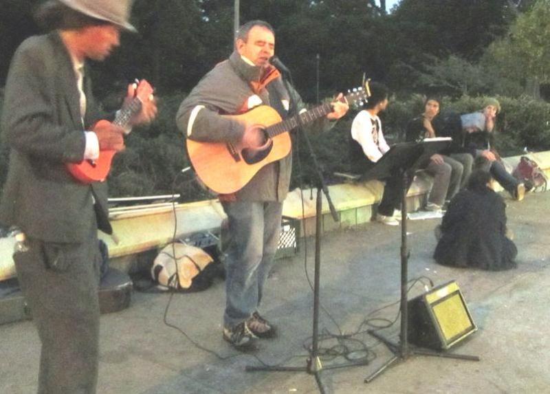 Street musician joins Eric on Haight St. 