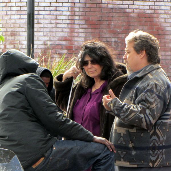 PAUL AND NOREEN PRAY WITH PEOPLE IN DOWNTOWN BERKELEY.