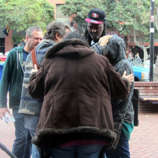 PAUL, NOREEN AND PHIL PRAY FOR PEOPLE IN BERKELEY.