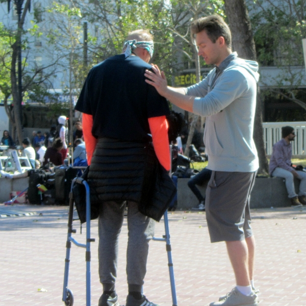 MATT PRAYS FOR MAN AT UN PLAZA.