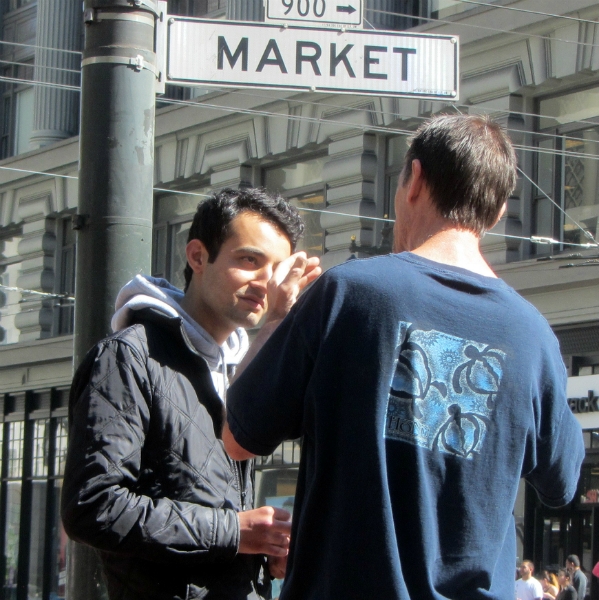 MIKE WITNESSES AT 5TH AND MARKET.