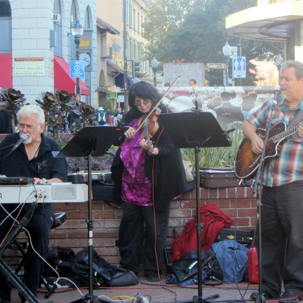 CHUCK GIRARD, NOREEN AND PAUL COCA MINISTER IN DOWNTOWN BERKELEY.