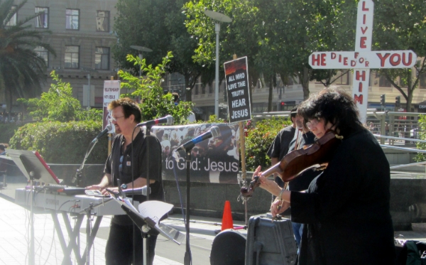 Chuck Girard and Noreen Coca play at Union Square on July 6.