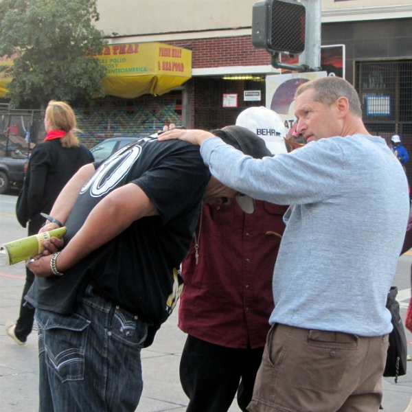 LOI AND ANDREW PRAY WITH MICHAEL AT 16TH ST. AND MISSION.