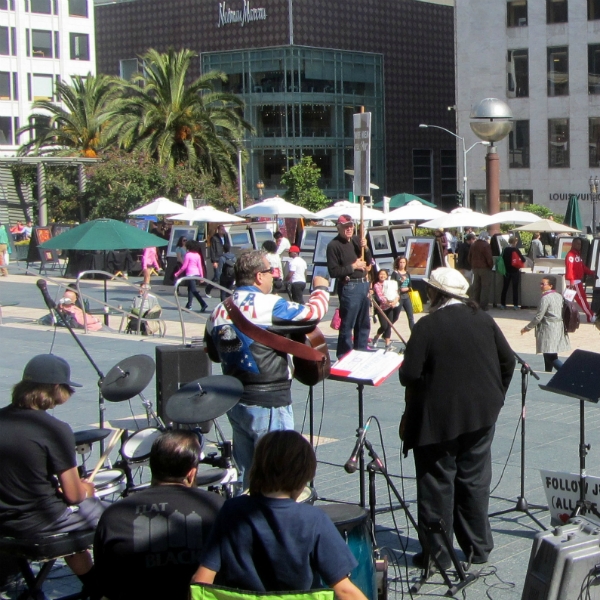 PAUL COCA AND FAMILY MINISTER AT UNION SQUARE. 