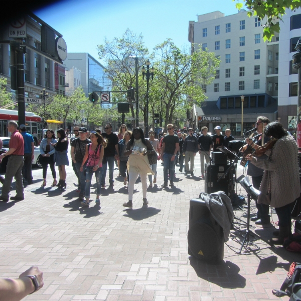 PAUL AND NOREEN COCA SING AT 5TH AND MARKET