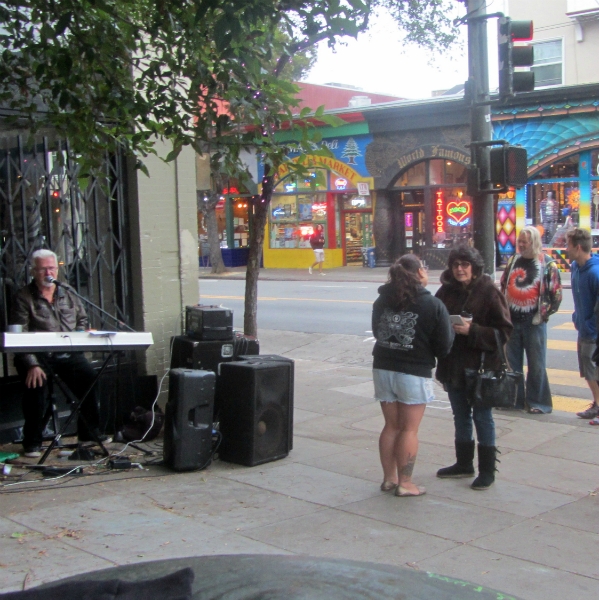 CHUCK GIRARD SINGS WHILE NOREEN WITNESSES ON HAIGHT ST.