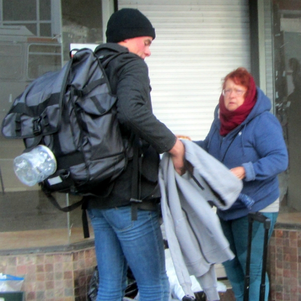 KATHY GIVES SWEATSHIRT TO MAN ON CASTRO ST