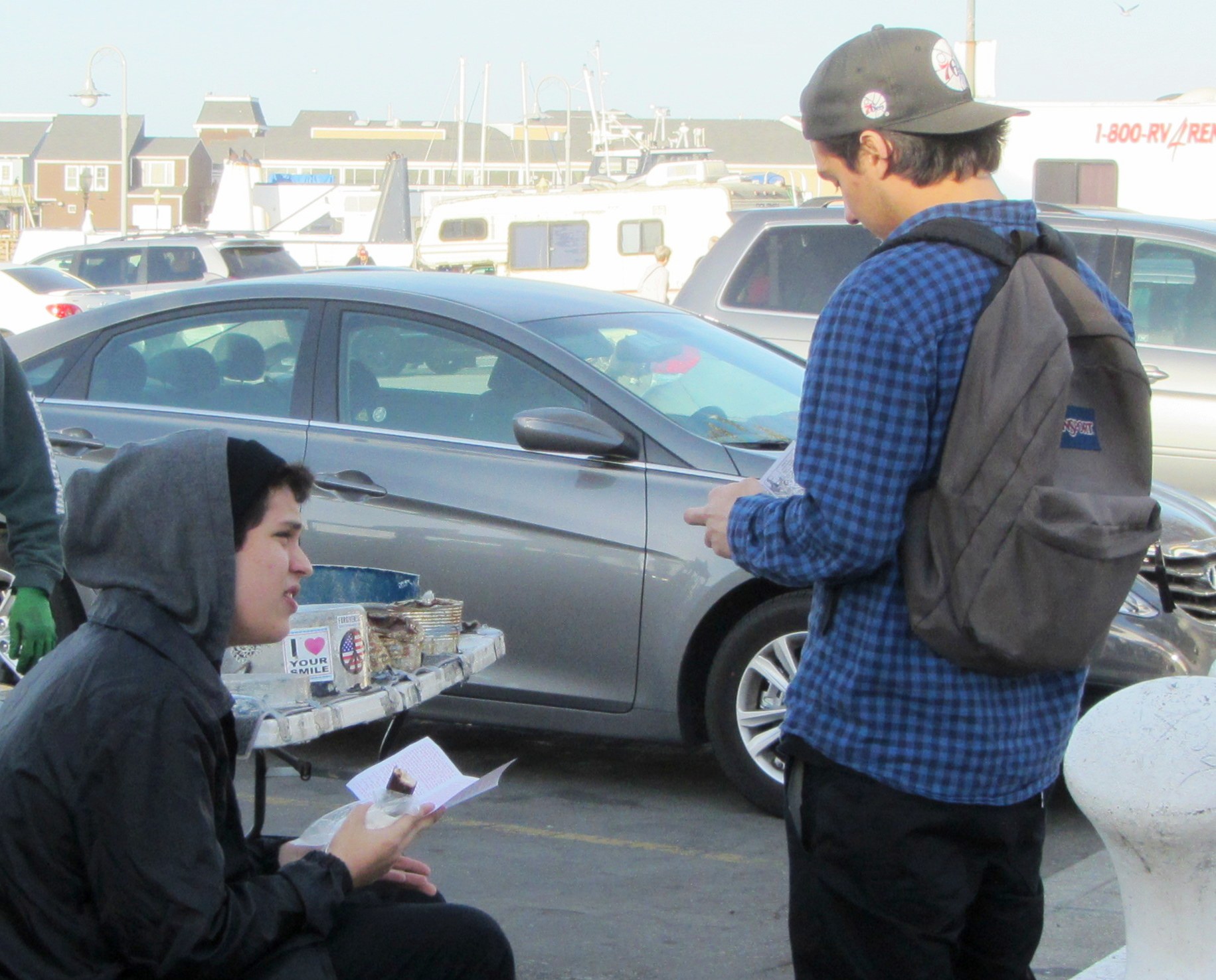 Tanis and Alex read tracts at Fisherman’s Wharf