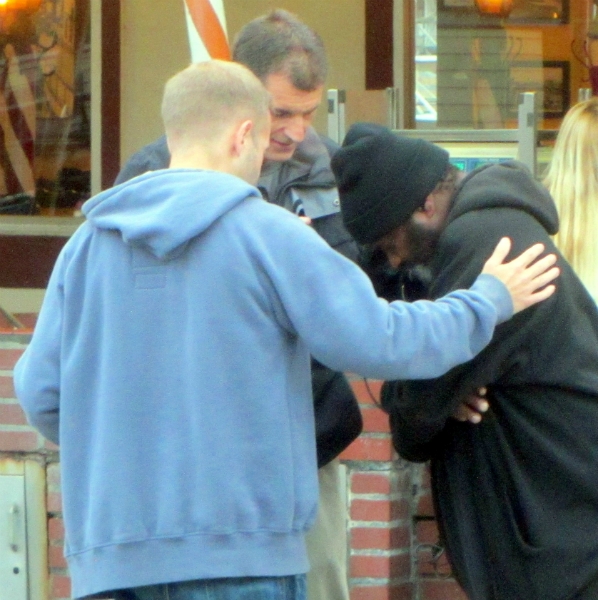 CAL AND MIKE PRAY FOR MAN AT UN PLAZA