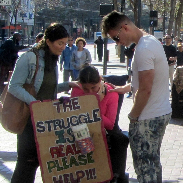 CHRISTY AND MATT PRAY WITH WOMAN IN WHEEL CHAIR AT 5TH AND MARKET. A MONTH LATER SHE WALKS BY AND TELLS US SHE WAS HEALED!