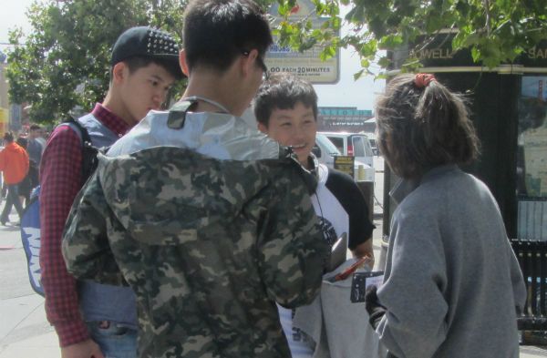 Mai witnesses to Chinese men in Chinese at Wharf. They hear gospel for first time.