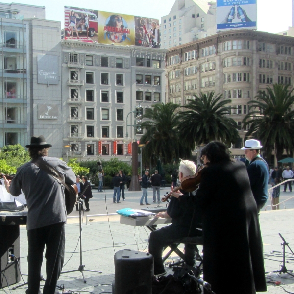 PAUL & NOREEN COCA, CHUCK GIRARD, AND MARTIN O. PLAY AT UNION SQUARE.