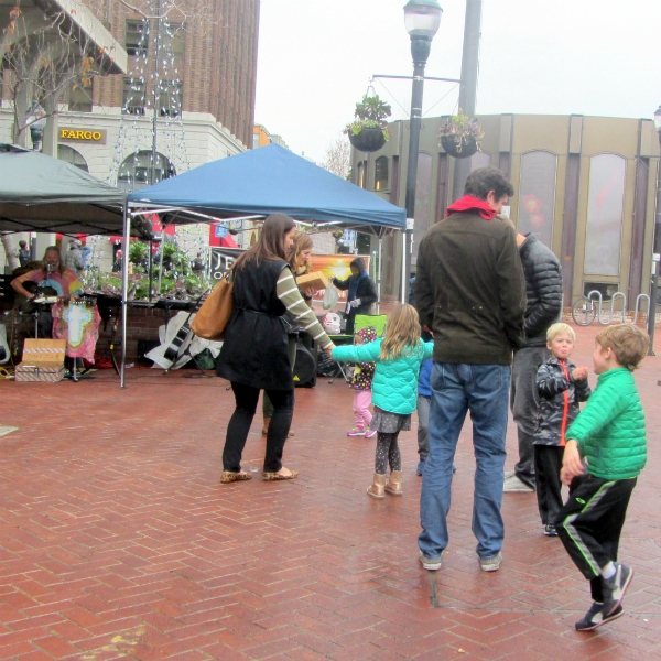 CHILDREN DANCE AS TIM SINGS IN BERKELEY.