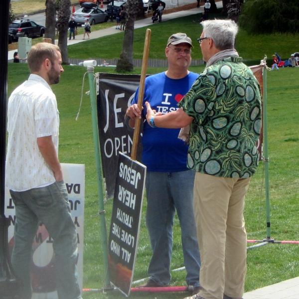 CAL AND ALLAN MINISTER TO PHIL AT DOLORES PARK.