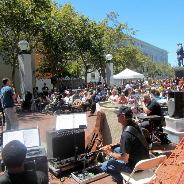 MIKE PREACHES AT CITY IMPACT OUTREACH AT UN PLAZA